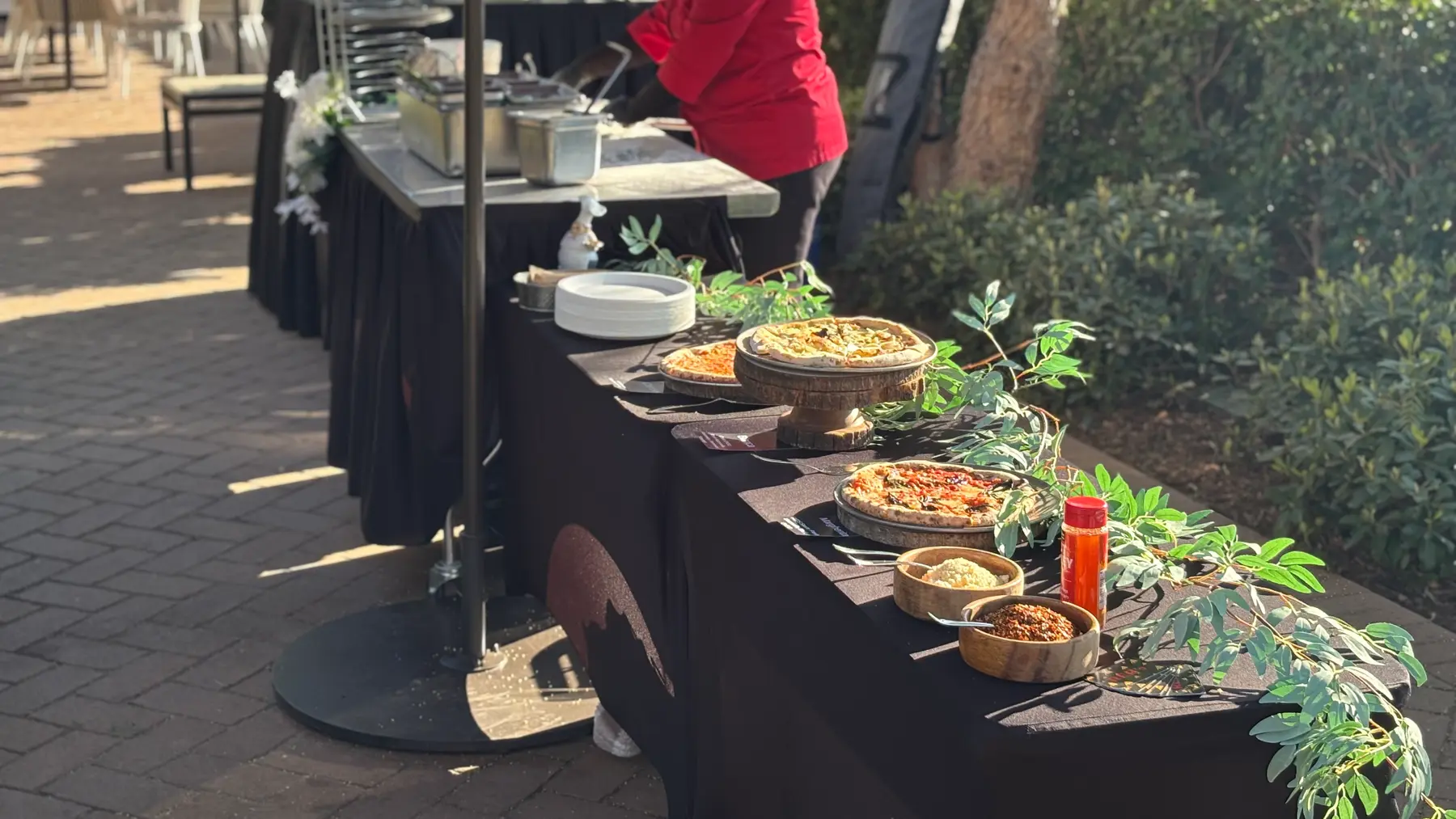 Full REDs Pizza buffet presentation at a catered event